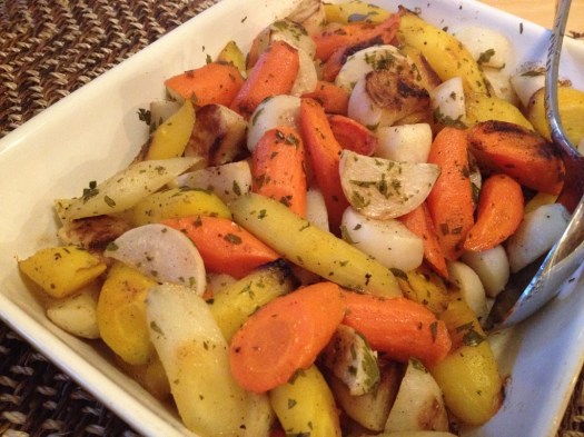 Roasted orange and yellow carrots with turnips