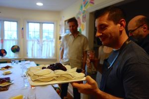 Berries cooked in wine atop thin slices of black radish