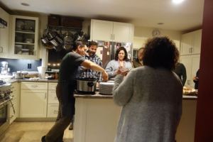 Introducing the guests to each other and to an array of appetizers