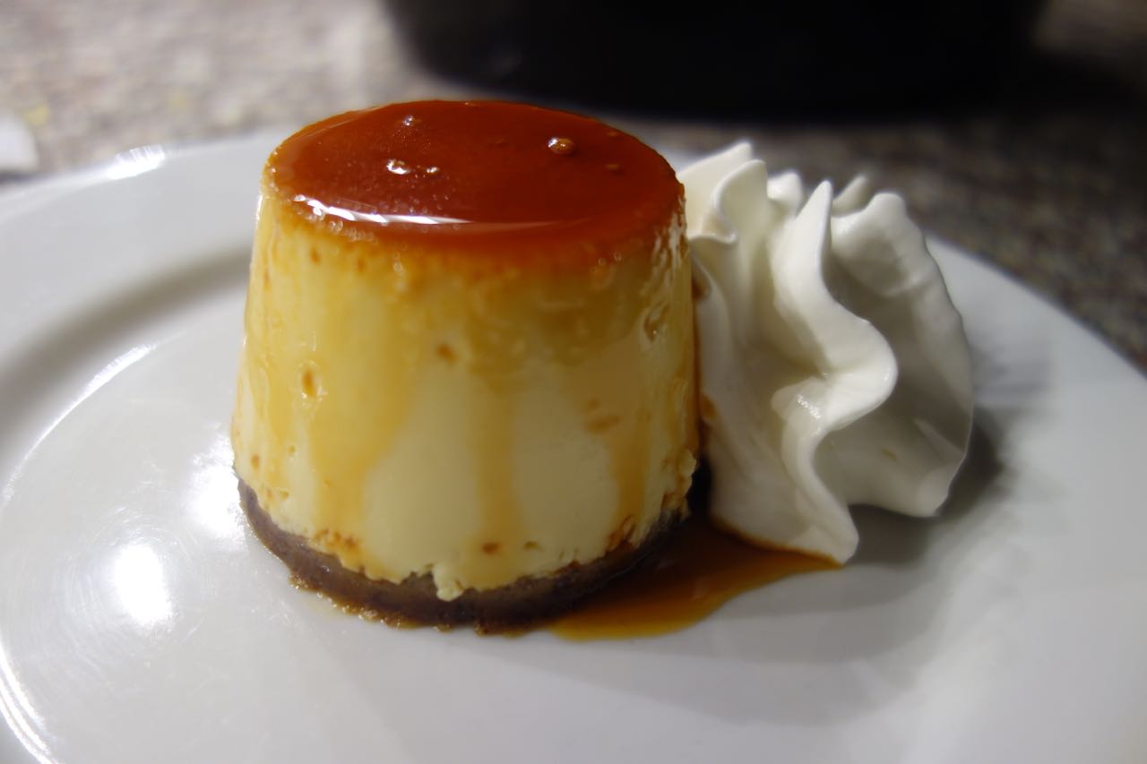 Flan with bienmesabe crust and cardamom and buttermilk whipped cream